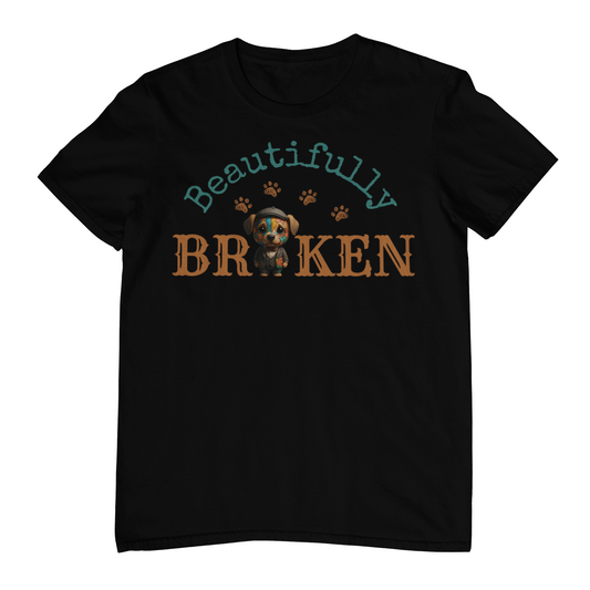 Beautifully Broken dog design shirt featuring a colorful dog in a suit with gold-filled cracks, faith-inspired graphic by Bellynza.